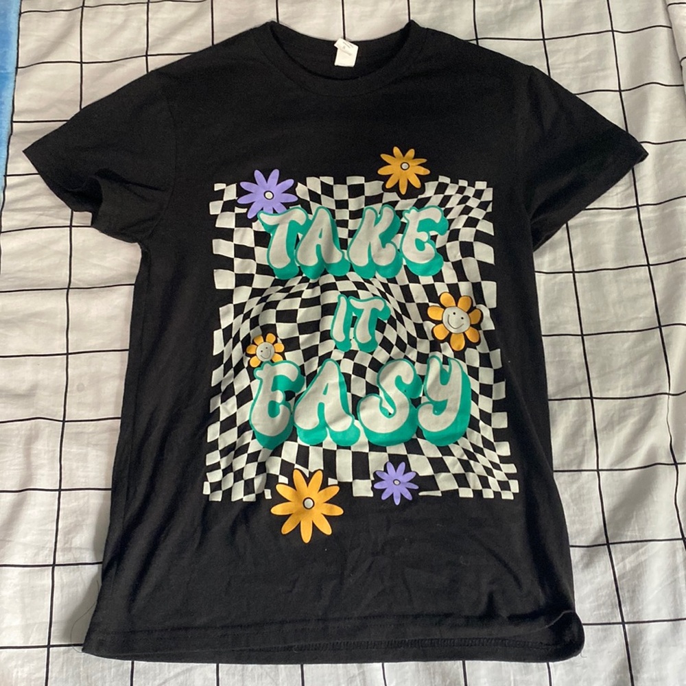 Black t-shirt with indie core designs.